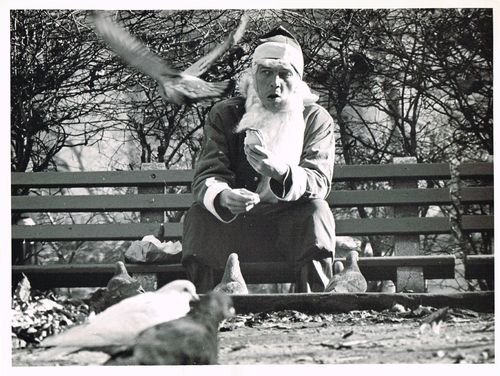 Santa claus feeding pidgeons